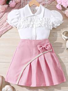 SHEIN Conjunto De Blusa De Multicapa Con Ribete De Volantes Y Falda Decorada Con Lazo Para Niñas Preadolescentes - Rosa - Ver 1