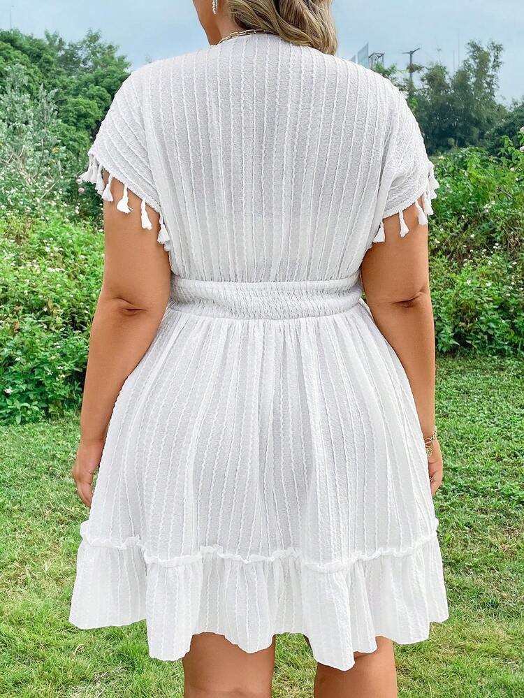 Plus Size Dress With Tassel Sleeve Cuffs And Ruffled Hem