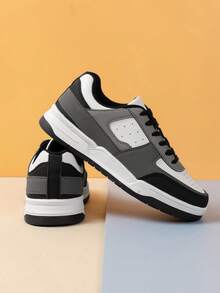 男童黑/灰色系pu面料綁帶運動鞋,舒適且防滑平底鞋底