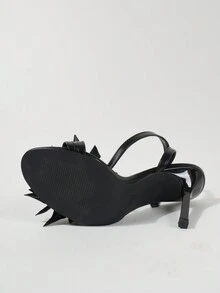 時尚女士用緞花和仿珍珠裝飾的高跟鞋，黑色踝帶鞋適用於雞尾酒派對