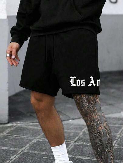 Manfinity LEGND 男式字母印花抽绳腰短裤纯黑色