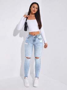 Jeans ajustados desgarro