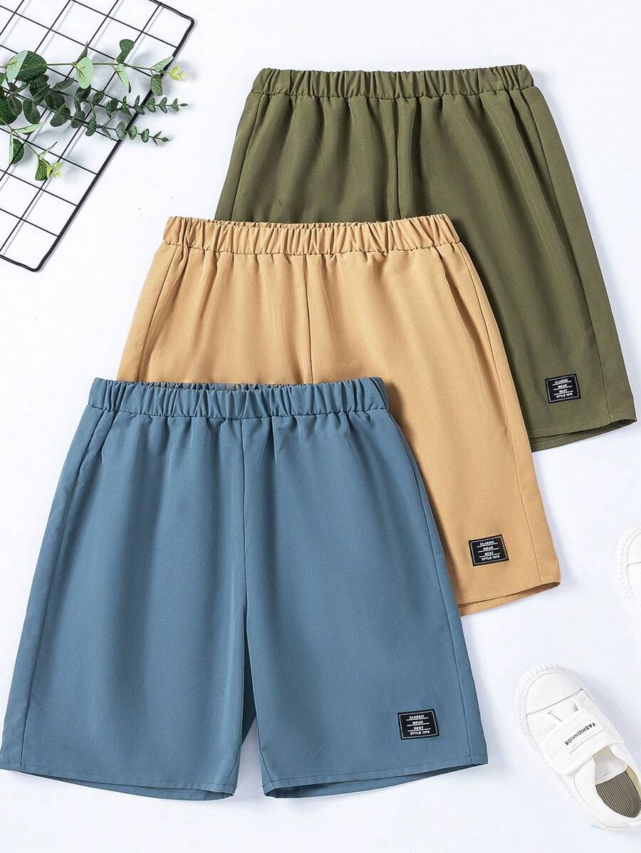 SHEIN Cậu bé Tween Màu thuần Quần short Với Chi tiết - Nhiều màu - Xem 1