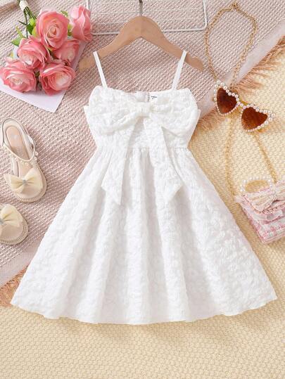 SHEIN Young Girl Girl's Textured Fabric Spaghetti Strap Dress With Bow Decoration,Holiday,Summer,Travel