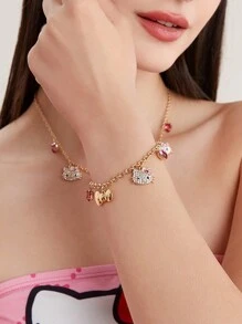 HELLO KITTY AND FRIENDS | SHEIN Brazalete de oro de aleación con decoración de strass - Dorado - Ver 1