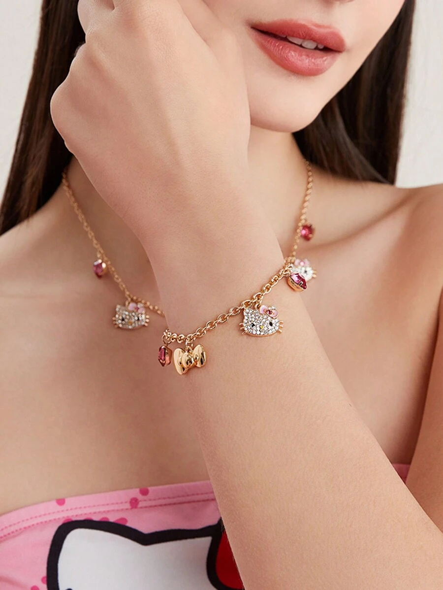 HELLO KITTY AND FRIENDS | SHEIN Brazalete de oro de aleación con decoración de strass - Dorado - Ver 1