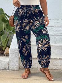 SHEIN VCAY Pantalón jogger con estampado tropical y puños elásticos en tallas grandes