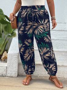 SHEIN VCAY Pantalón jogger con estampado tropical y puños elásticos en tallas grandes