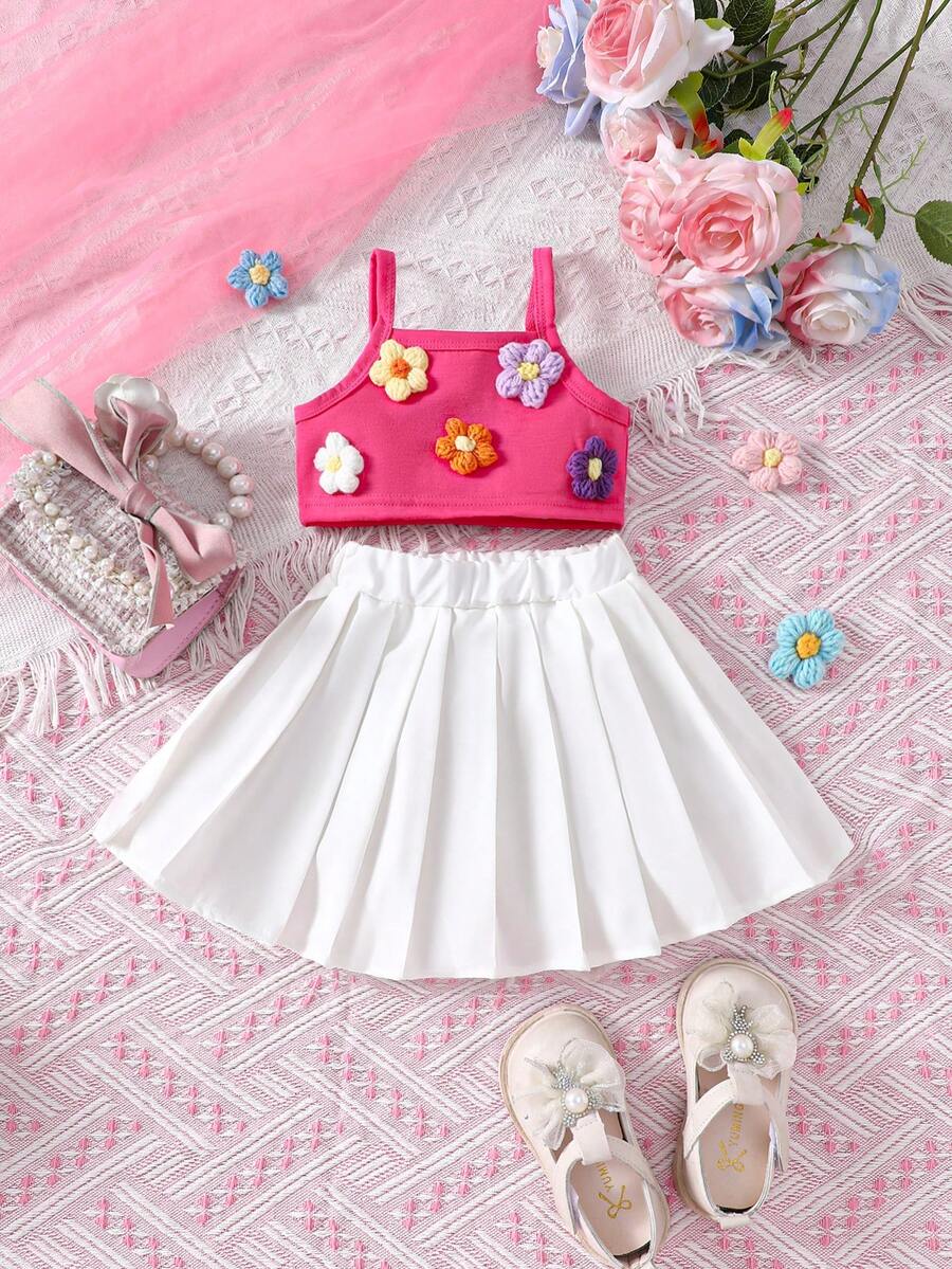 SHEIN Conjunto de niña bebé decorado con flores 3D que incluye camiseta sin mangas y falda plisada - Rosa - Ver 1