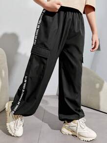 SHEIN Calças Folgadas De Tecido Casual Resort Para Meninos Adolescentes Com Patch De Letras E Bolsos De Patch Tridimensionais.