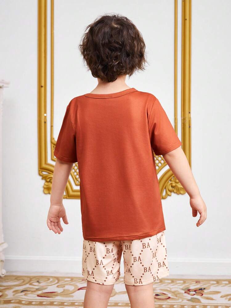 Young Boys Cartoon Bear Print Short-Sleeved T-Shirt And Shorts Two-Piece Set