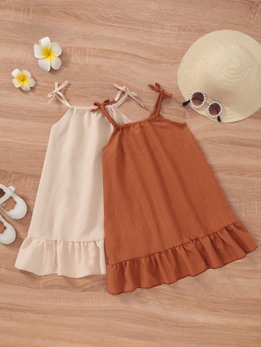 SHEIN Vintaside Kids 夏日年輕女孩的簡單休閒無袖細肩帶蝴蝶結設計寬鬆a字裙 - 彩色 - 查看 1