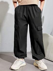 SHEIN Calças Folgadas De Tecido Casual Resort Para Meninos Adolescentes Com Patch De Letras E Bolsos De Patch Tridimensionais.