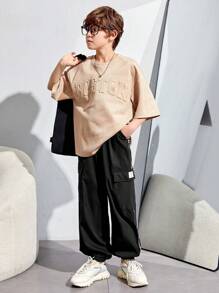 SHEIN Calças Folgadas De Tecido Casual Resort Para Meninos Adolescentes Com Patch De Letras E Bolsos De Patch Tridimensionais.