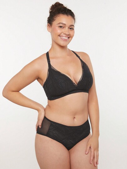 LUVLETTE Sujetador sin aros de encaje de corte bajo y espalda de tirantes cruzados en color negro, lencería tipo 'bralette' minimizador, como prenda exterior