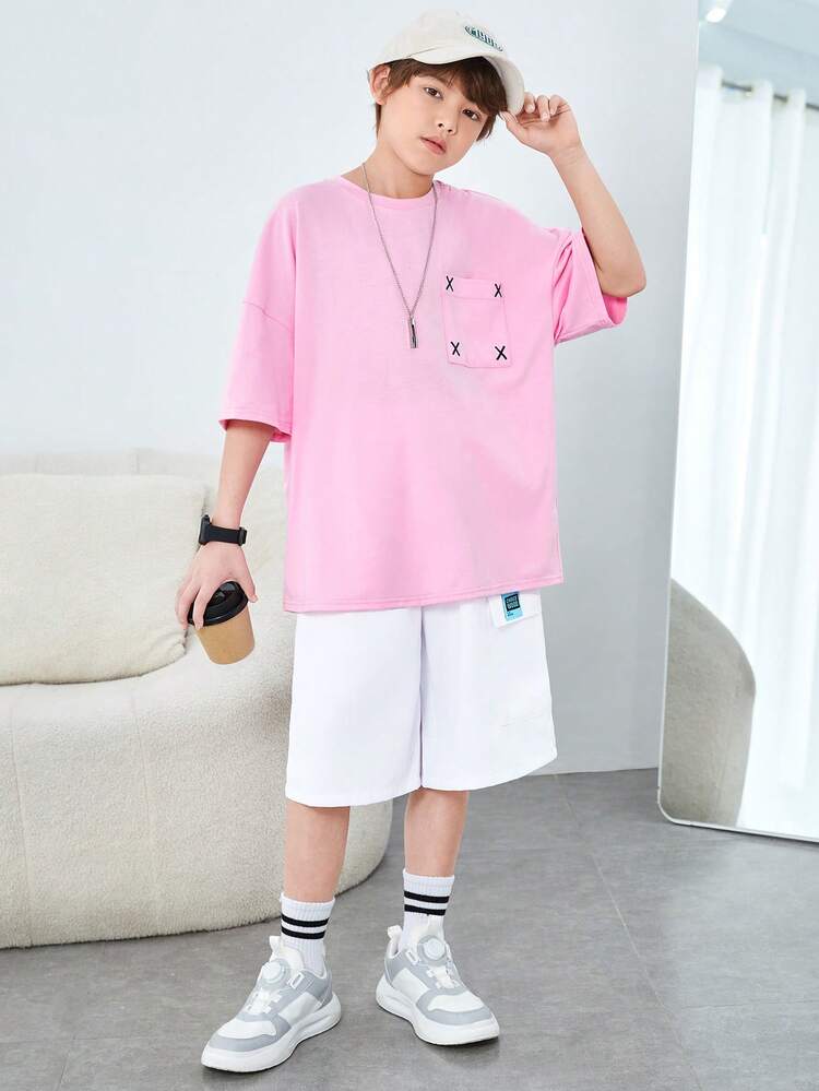 2pcs/Set Tween Boys' Casual Loose Fit Knit Short Sleeve Tee With Pockets & Mesh Shorts With Embroidered Patch