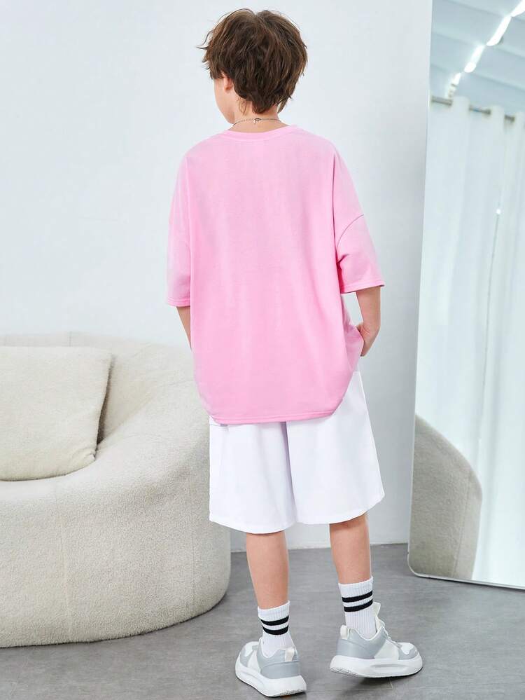 2pcs/Set Tween Boys' Casual Loose Fit Knit Short Sleeve Tee With Pockets & Mesh Shorts With Embroidered Patch