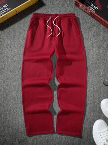 Manfinity Roghcode Pantalones de chándal holgados de unicolor con cordón para hombre, sueltos y largos de color rojo oscuro para salir de forma casual