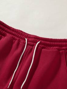 Manfinity Roghcode Pantalones de chándal holgados de unicolor con cordón para hombre, sueltos y largos de color rojo oscuro para salir de forma casual