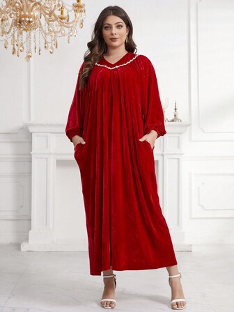 加大尺碼燈籠袖折疊褶皺斜口袋連衣裙