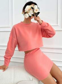 EURMUSE Women's Solid Color Round Neck Drop Shoulder Long Sleeve Top And Bodycon Mini Skirt Casual Suit - Orange - View 5