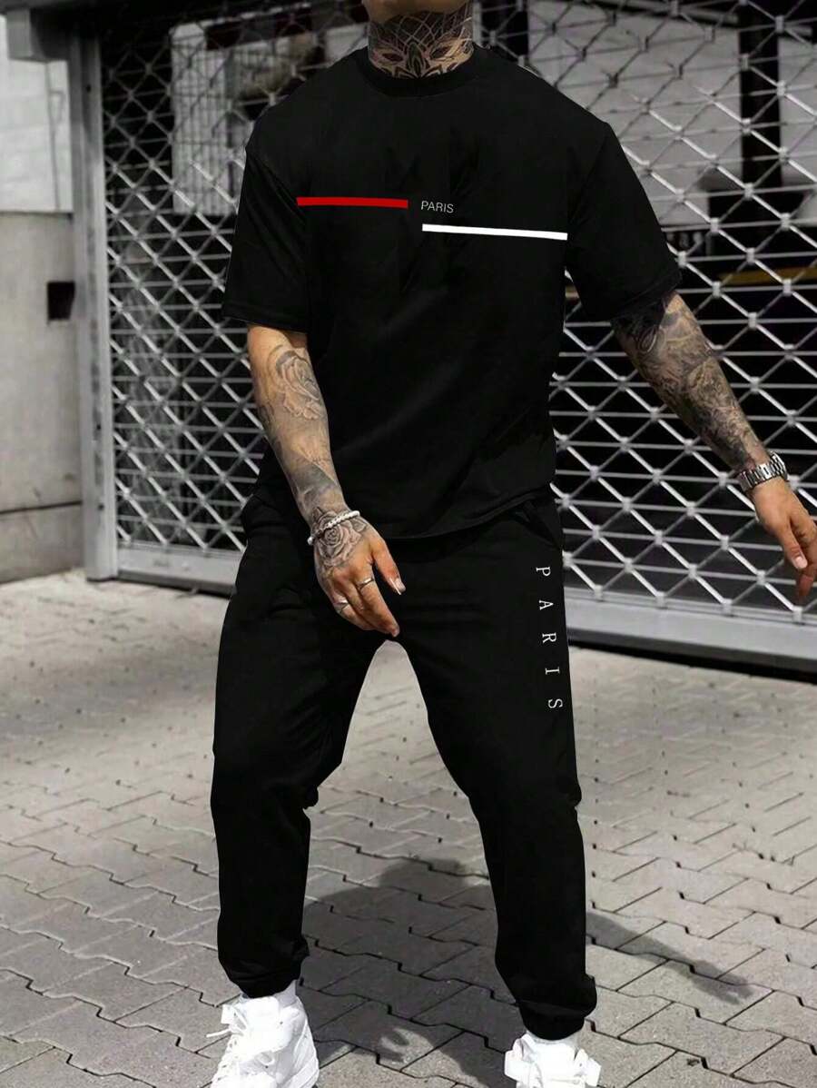 Manfinity Roughcore 男士大码休闲字母巴黎印花短袖 T 恤和裤子外出套装 - 黑色 - 查看 1