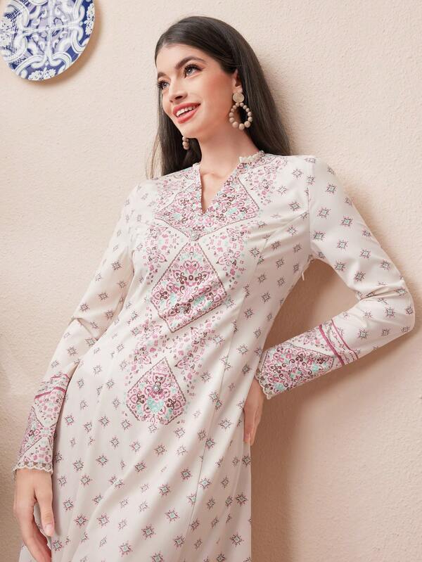 Divindia 女士長袖kurta,有鋸齒狀的領口和幾何圖案