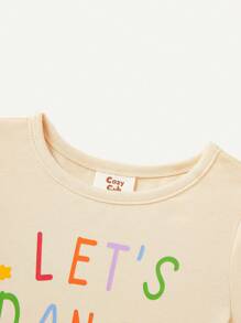 Cozy Pixies Baby Girl Snug Fit Pajama Set With Slogan Printed Short Sleeve Top And Flower Printed Pants - Apricot - View 7