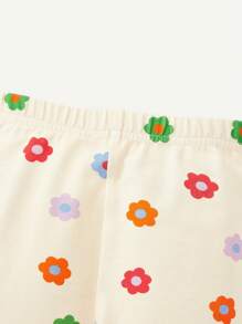 Cozy Pixies Baby Girl Snug Fit Pajama Set With Slogan Printed Short Sleeve Top And Flower Printed Pants - Apricot - View 9