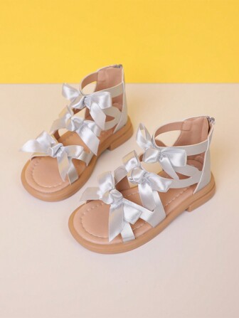 女孩蝴蝶结装饰公主凉鞋，时尚软底露趾鞋