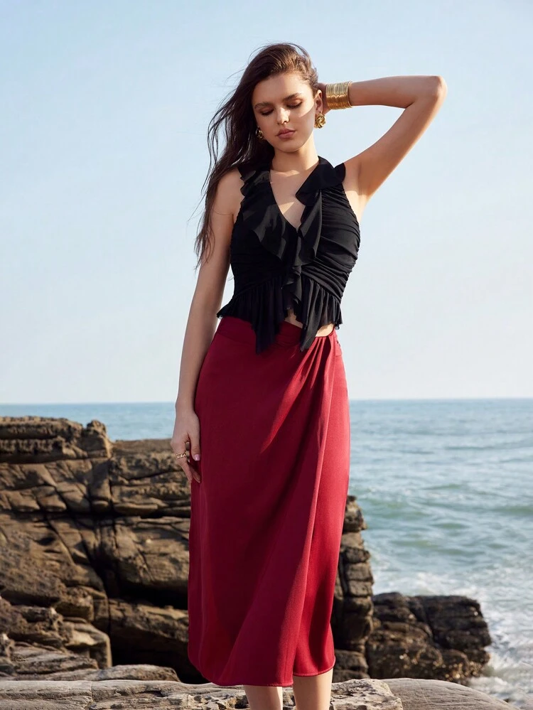 Solid Color Ruffled Hem Halter Neck Backless Top