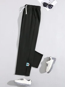 SHEIN Teenage Boys' Casual Loose Fit Drawstring Waist Sweatpants With Brand Label, Summer