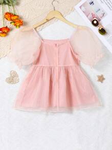 Blusa de manga corta con contraste en malla y volante en el bajo para niña adolescente