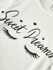 Conjunto de pijama de manga curta com top temático Tween Girl e calça estampada com corações