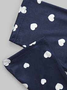 Conjunto de pijama de manga curta com top temático Tween Girl e calça estampada com corações