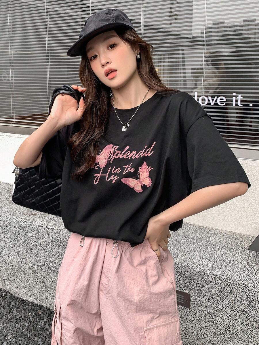 DAZY Women's Loose Fit Round Neck Short Sleeve T-Shirt With Printed Slogan And Butterfly Pattern Summer Oversized T-Shirt,Graphic Tees - Black - View 1