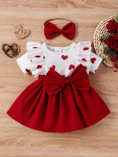 Vestido para bebé niña con patrón de corazones, dobladillo de rayas con volantes y adornos de lazo