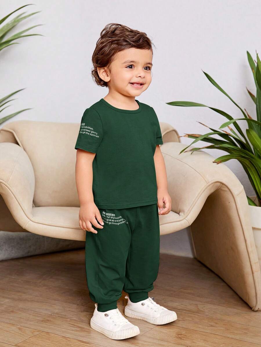 SHEIN Leap Crew Đứa bé trai Giải trí & Thoải mái Slogan In Thể thao Bộ đồ - Màu xanh lá cây đậm - Xem 1
