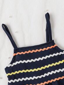 Robe bébé fille à bretelles avec superpositions de dentelle ondulée