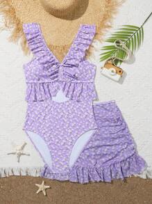 少女印花泳裝,前面設有空心設計和荷葉邊細節,折疊側邊的裙裝泳裝,2入組