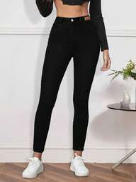 Pantalon skinny à taille haute et coupé