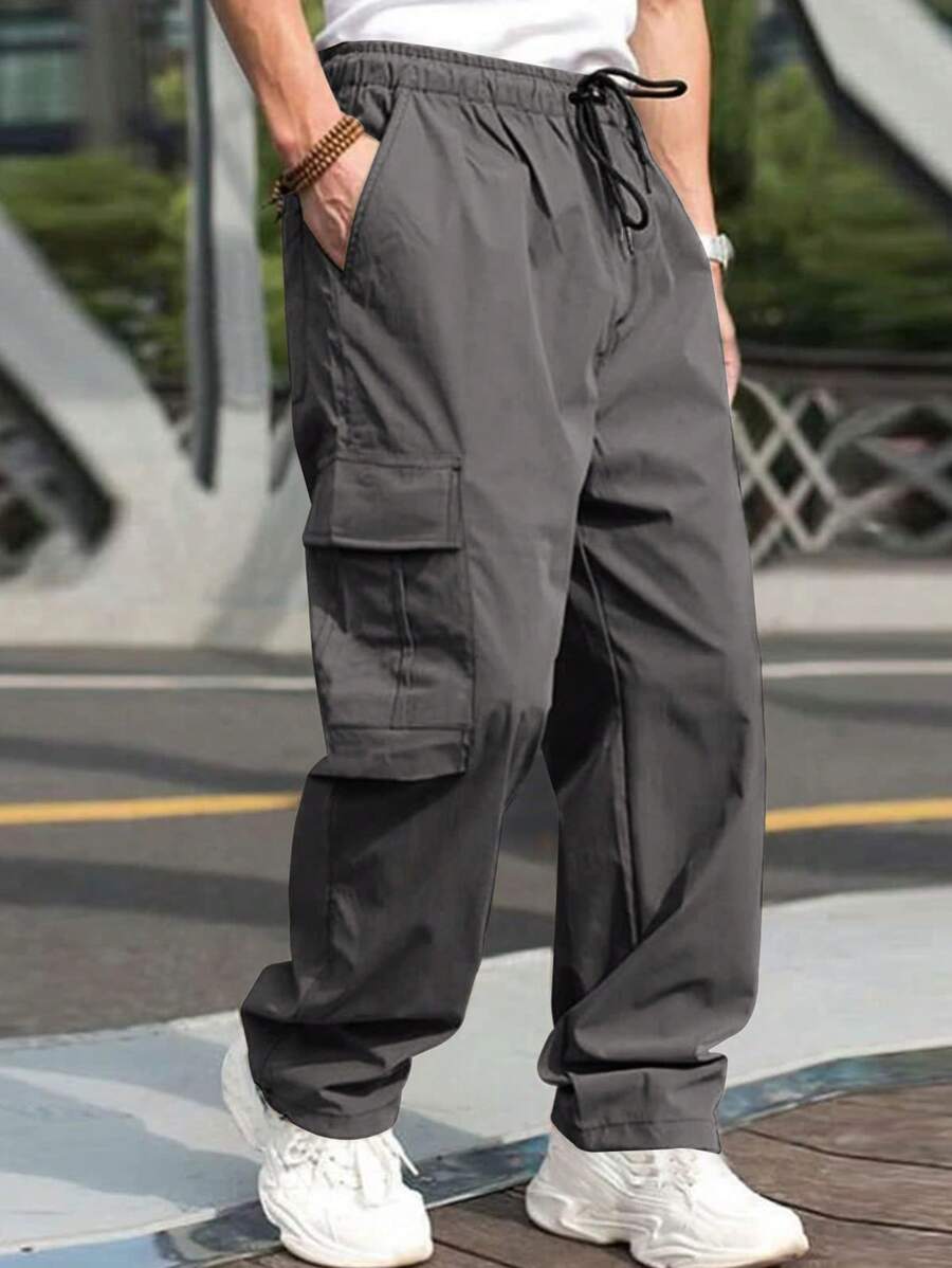 Pantaloni cargo da uomo con coulisse, tinta unita, con tasche oblique - Grigio - Visualizzare 1