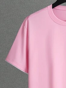 Manfinity Homme Conjunto de camiseta de manga corta y pantalones cortos con recorte de color bloque rosado para salir, para hombre