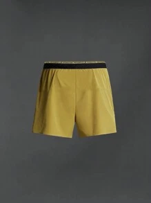 Manfinity Sport Corelite Herren Sport Shorts mit Buchstaben Muster und Kordelzug, Gelbe Jogger Shorts