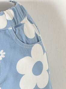 SHEIN Vaqueros De Mezclilla Lavada Suave Con Estampado De Flores Para Niñas Jóvenes