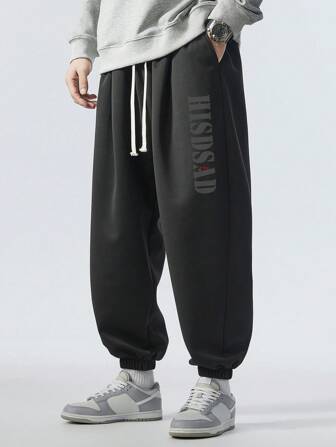 大码男士休闲松紧腰宽松运动裤，品牌运动裤