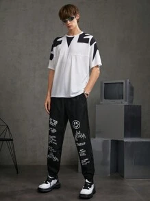 Manfinity RebelGame 男士標語圖案梭織休閒褲 - 黑色 - 查看 1