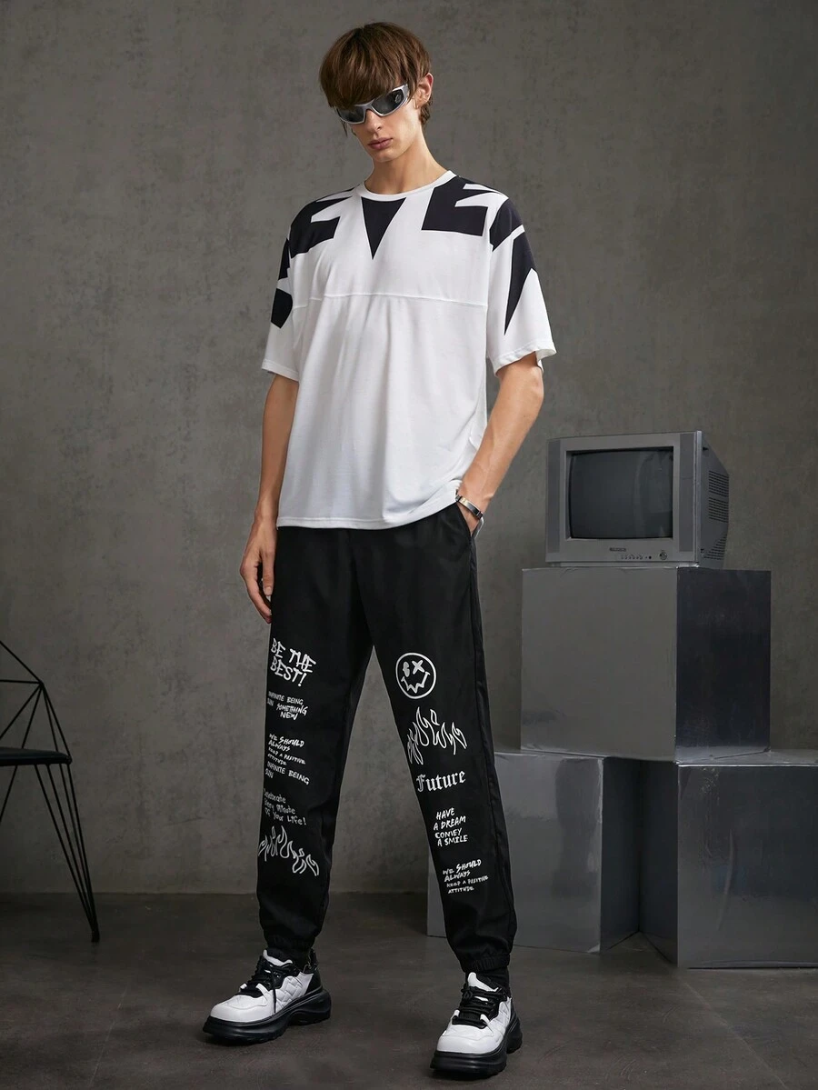 Manfinity RebelGame 男士標語圖案梭織休閒褲 - 黑色 - 查看 1