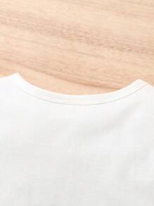 SHEIN Young Girls' Heart Printed Top & Polka Dot Printed Shorts Set