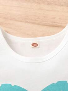 SHEIN Young Girls' Heart Printed Top & Polka Dot Printed Shorts Set